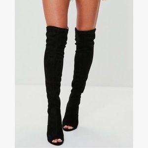 Thigh high black torrid peep toe boots